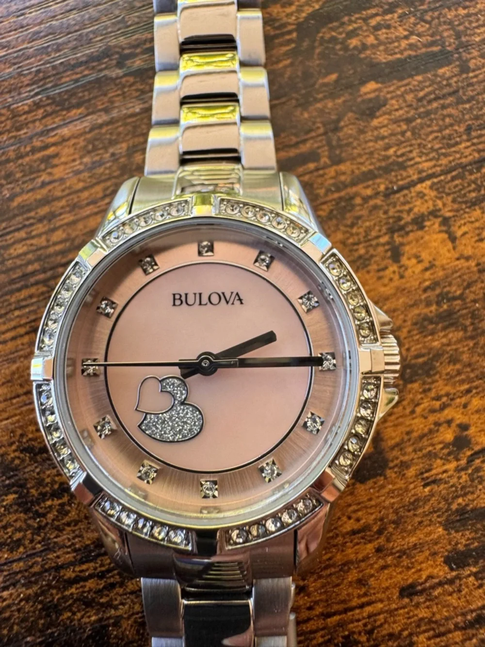 Bulova Silver Tone Watch with Pink Dial and Heart Accent